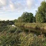 De luxe kamer met veel faciliteiten dichtbij strand en natuurgebied